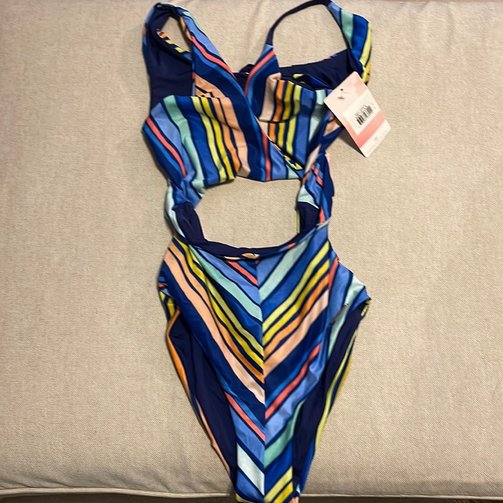 One piece swimsuit with cut outs